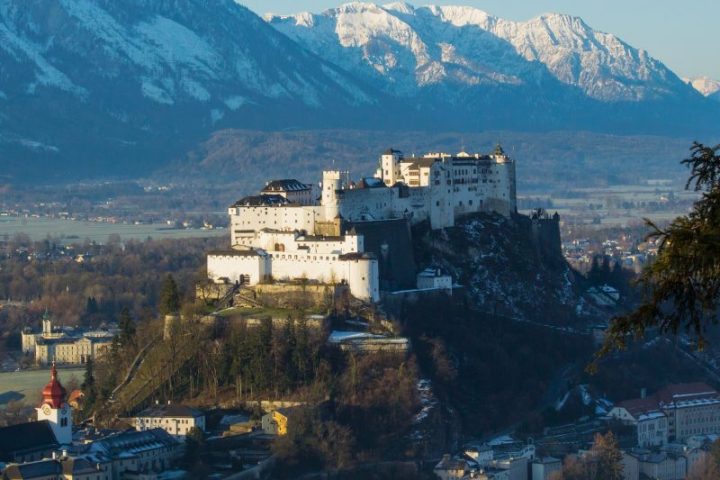 a view of a city with a mountain in the background