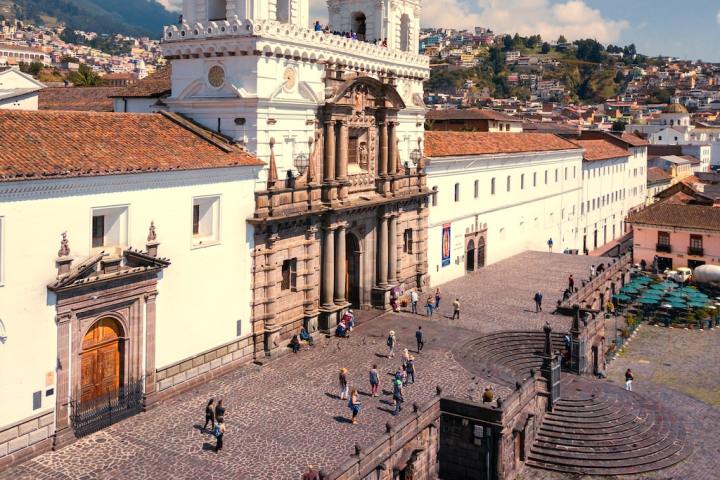 a group of people in front of a building